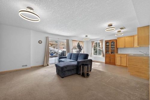 154 Sienna Ridge Landing Sw, Calgary, AB - Indoor Photo Showing Living Room