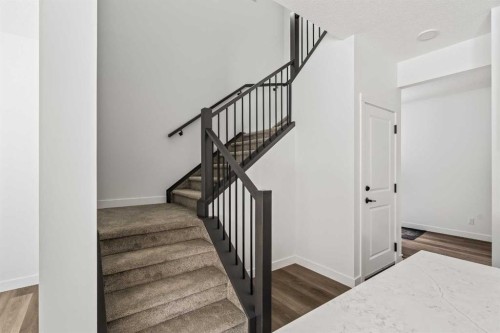 49 Starling Passage Nw, Calgary, AB - Indoor Photo Showing Other Room