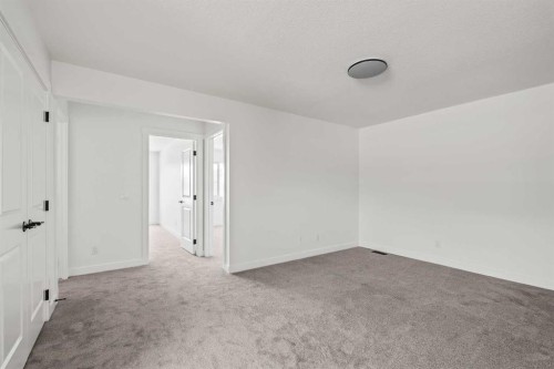 49 Starling Passage Nw, Calgary, AB - Indoor Photo Showing Other Room