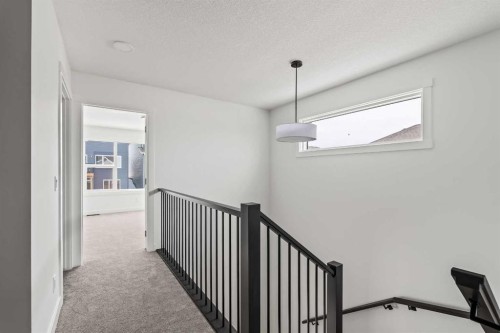49 Starling Passage Nw, Calgary, AB - Indoor Photo Showing Other Room