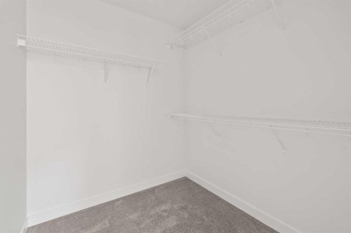 49 Starling Passage Nw, Calgary, AB - Indoor With Storage