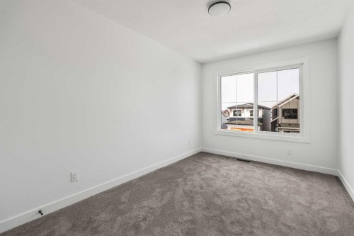 49 Starling Passage Nw, Calgary, AB - Indoor Photo Showing Other Room