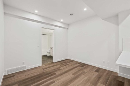 49 Starling Passage Nw, Calgary, AB - Indoor Photo Showing Other Room