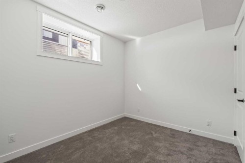 49 Starling Passage Nw, Calgary, AB - Indoor Photo Showing Other Room