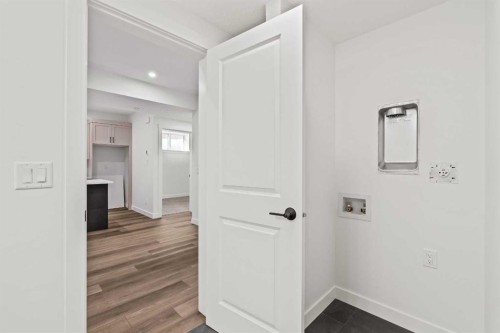 49 Starling Passage Nw, Calgary, AB - Indoor Photo Showing Other Room