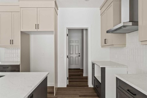 49 Starling Passage Nw, Calgary, AB - Indoor Photo Showing Kitchen