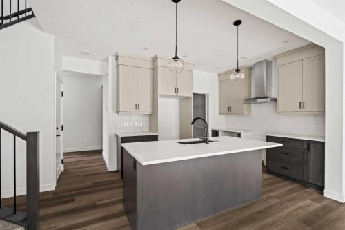 49 Starling Passage Nw, Calgary, AB - Indoor Photo Showing Kitchen With Upgraded Kitchen