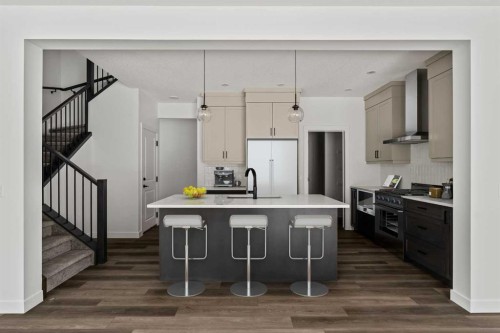 49 Starling Passage Nw, Calgary, AB - Indoor Photo Showing Kitchen With Upgraded Kitchen