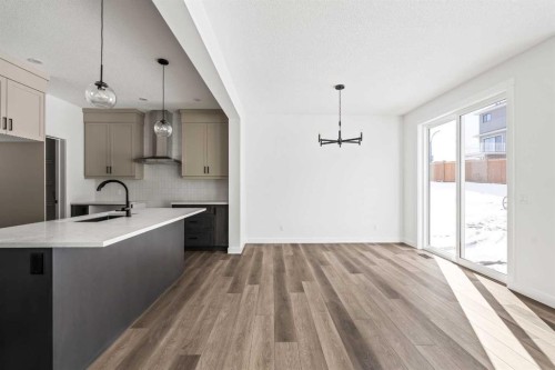 49 Starling Passage Nw, Calgary, AB - Indoor Photo Showing Kitchen With Upgraded Kitchen