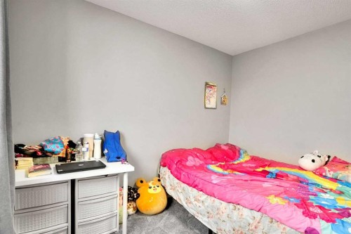 39 Douglasview Road Se, Calgary, AB - Indoor Photo Showing Bedroom