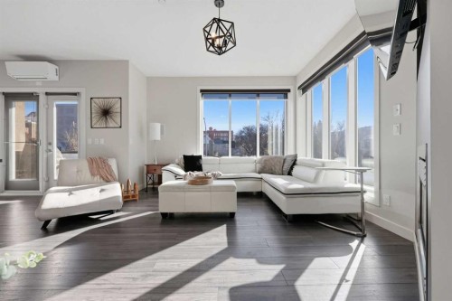 206-910 18 Avenue Sw, Calgary, AB - Indoor Photo Showing Living Room