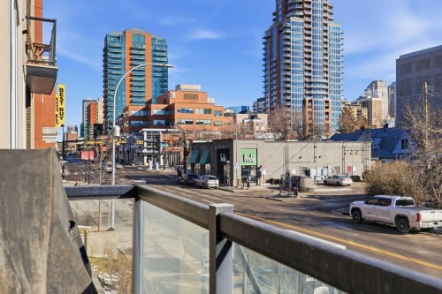 206-910 18 Avenue Sw, Calgary, AB - Outdoor With Balcony With Facade