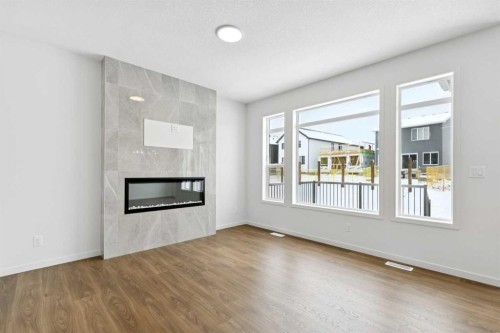 175 Herron Landing Ne, Calgary, AB - Indoor Photo Showing Living Room With Fireplace
