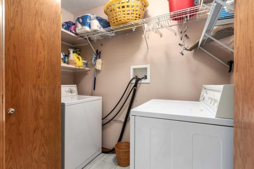 912 Riverside Drive Nw, High River, AB - Indoor Photo Showing Laundry Room