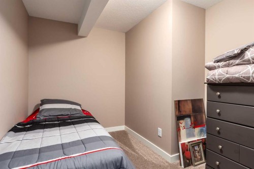 912 Riverside Drive Nw, High River, AB - Indoor Photo Showing Bedroom