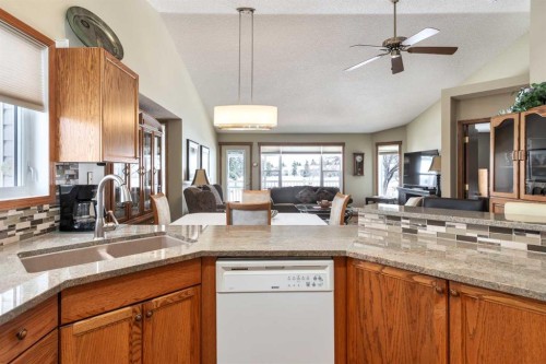 912 Riverside Drive Nw, High River, AB - Indoor Photo Showing Kitchen With Double Sink