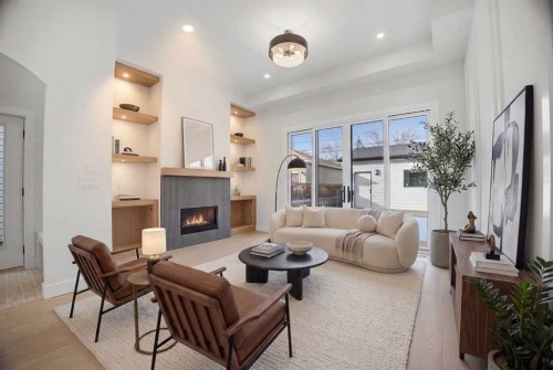 806 23 Avenue Se, Calgary, AB - Indoor Photo Showing Living Room With Fireplace