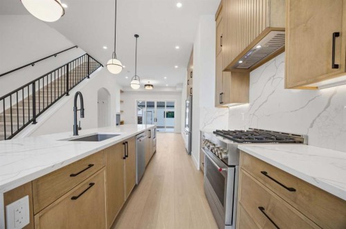 806 23 Avenue Se, Calgary, AB - Indoor Photo Showing Kitchen With Upgraded Kitchen