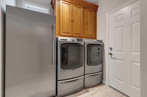 52 Sandstone Ridge Crescent, Okotoks, AB - Indoor Photo Showing Laundry Room