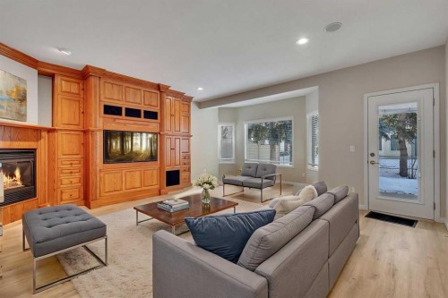 52 Sandstone Ridge Crescent, Okotoks, AB - Indoor Photo Showing Living Room With Fireplace
