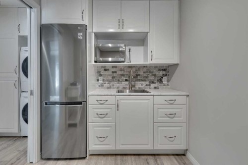 52 Sandstone Ridge Crescent, Okotoks, AB - Indoor Photo Showing Kitchen