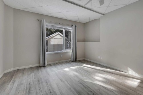 52 Sandstone Ridge Crescent, Okotoks, AB - Indoor Photo Showing Other Room