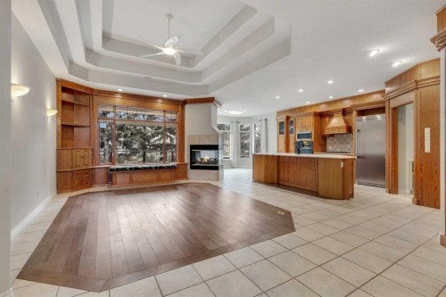 52 Sandstone Ridge Crescent, Okotoks, AB - Indoor With Fireplace