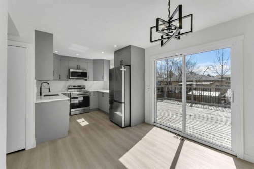 62 Deer Ridge Way Se, Calgary, AB - Indoor Photo Showing Kitchen With Stainless Steel Kitchen