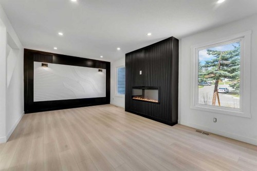 62 Deer Ridge Way Se, Calgary, AB - Indoor With Fireplace