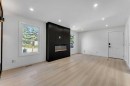 62 Deer Ridge Way Se, Calgary, AB  - Indoor Photo Showing Other Room With Fireplace 