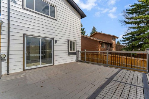 62 Deer Ridge Way Se, Calgary, AB - Outdoor With Deck Patio Veranda With Exterior