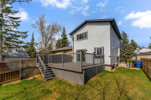 62 Deer Ridge Way Se, Calgary, AB - Outdoor With Deck Patio Veranda