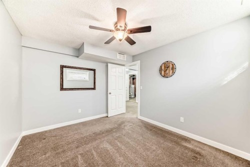 57 Cimarron Meadows Crescent, Okotoks, AB - Indoor Photo Showing Other Room