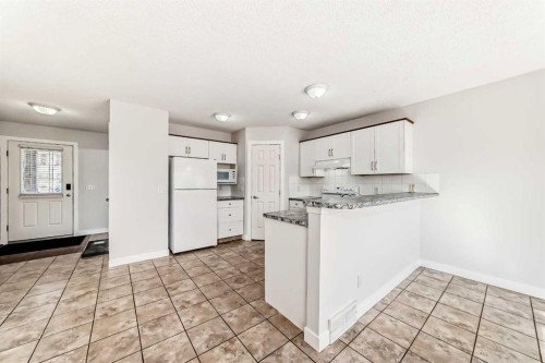 57 Cimarron Meadows Crescent, Okotoks, AB - Indoor Photo Showing Kitchen