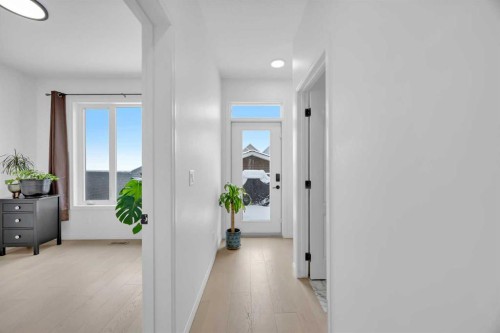 76 Edith Mews Nw, Calgary, AB - Indoor Photo Showing Other Room