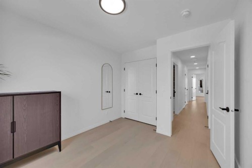 76 Edith Mews Nw, Calgary, AB - Indoor Photo Showing Other Room