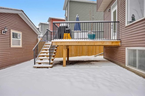 76 Edith Mews Nw, Calgary, AB - Outdoor With Exterior