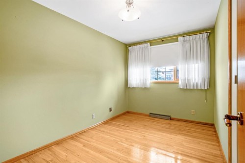 47 Montrose Crescent Ne, Calgary, AB - Indoor Photo Showing Other Room