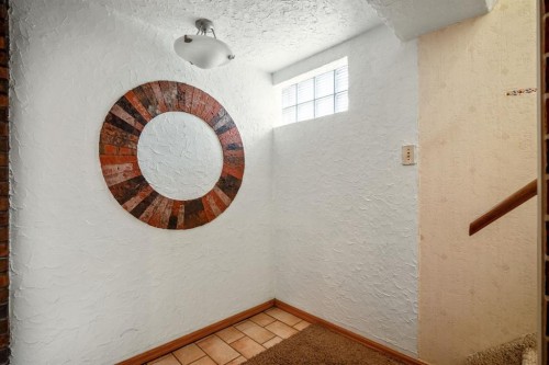 47 Montrose Crescent Ne, Calgary, AB - Indoor Photo Showing Other Room