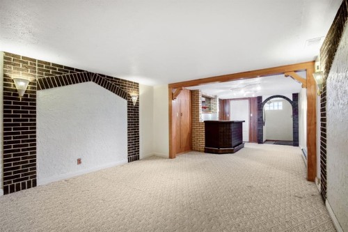 47 Montrose Crescent Ne, Calgary, AB - Indoor Photo Showing Other Room