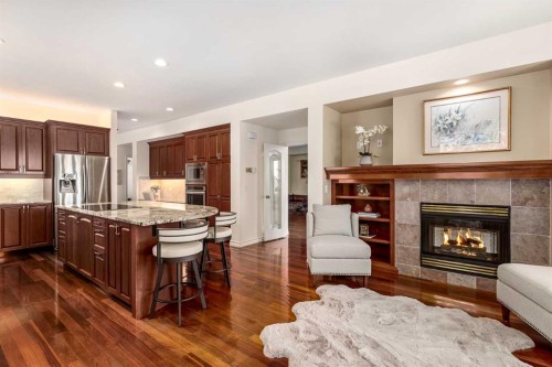 33 Ridge Pointe Drive, Heritage Pointe, AB - Indoor Photo Showing Living Room With Fireplace