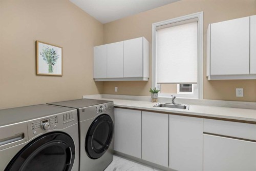 33 Ridge Pointe Drive, Heritage Pointe, AB - Indoor Photo Showing Laundry Room
