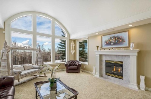 33 Ridge Pointe Drive, Heritage Pointe, AB - Indoor Photo Showing Living Room With Fireplace