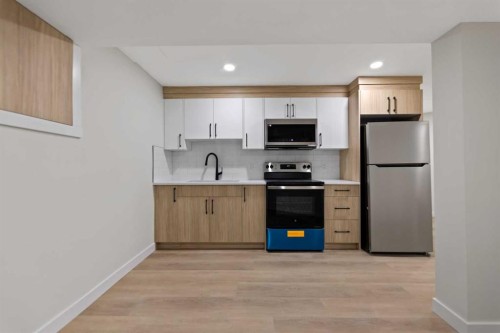 2031 24 Avenue Ne, Calgary, AB - Indoor Photo Showing Kitchen With Stainless Steel Kitchen