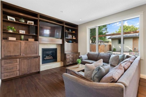 1914 Broadview Road Nw, Calgary, AB - Indoor Photo Showing Living Room With Fireplace