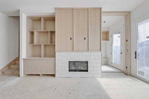 2231 2 Avenue Nw, Calgary, AB - Indoor Photo Showing Other Room With Fireplace