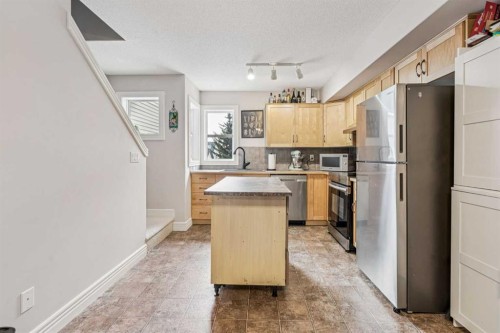324 Bridlewood Lane Sw, Calgary, AB - Indoor Photo Showing Kitchen