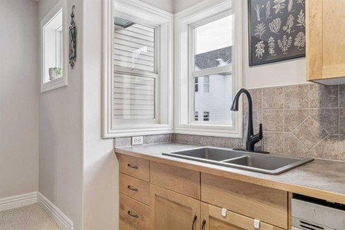 324 Bridlewood Lane Sw, Calgary, AB - Indoor Photo Showing Kitchen With Double Sink