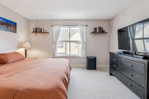 324 Bridlewood Lane Sw, Calgary, AB - Indoor Photo Showing Bedroom