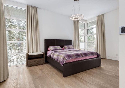 106 Pumpridge Place Sw, Calgary, AB - Indoor Photo Showing Bedroom